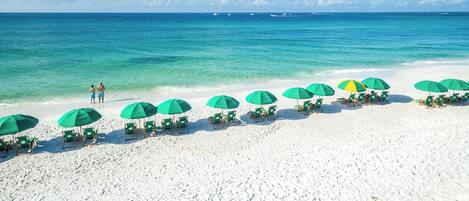 On the beach, sun loungers, beach towels