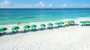 On the beach, sun loungers, beach towels