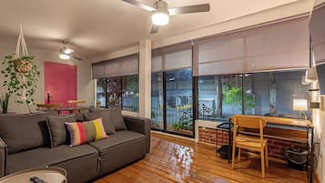 Comfort Apartment, Balcony, City View | Living area | Smart TV, heated floors