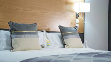 Executive Double Room | Minibar, in-room safe, individually decorated, desk