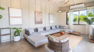 Villa Deluxe, vista parcial al mar | Área de sala de estar