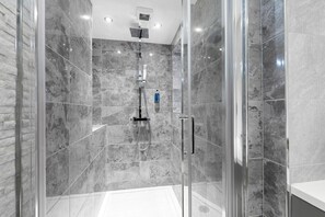 Shower, hair dryer, towels