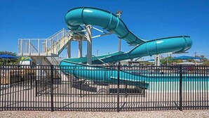 A water park with a large turquoise slide structure. - Tempe Getaway w/Pool & Near ASU! (Tempe)
