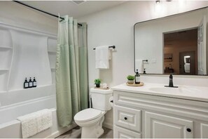 Hair dryer, towels, soap, shampoo