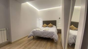 2 slaapkamers, een strijkplank/strijkijzer, reisbedje, gratis wifi