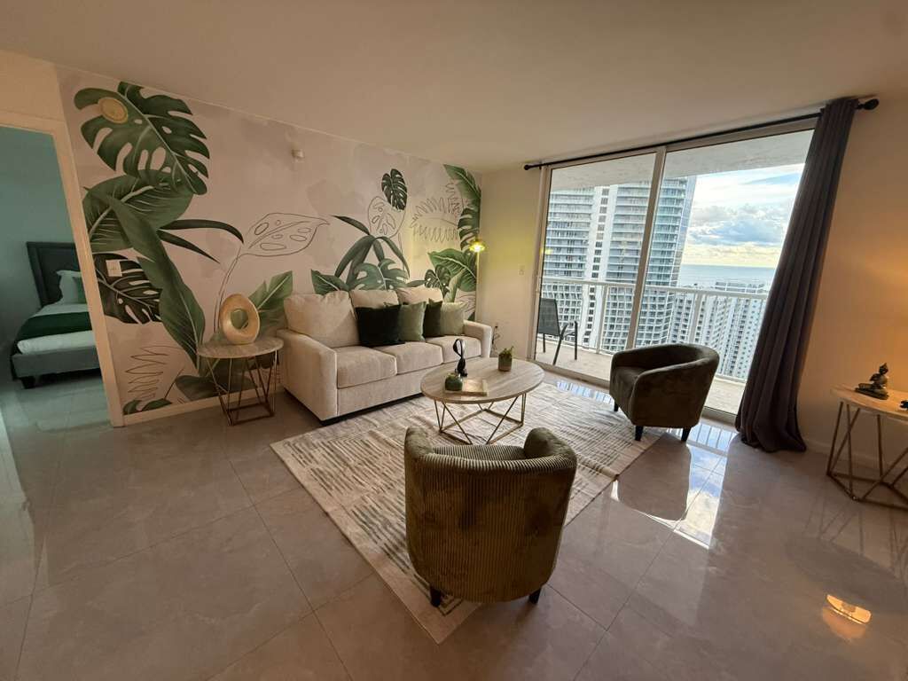 Deluxe Condo | Living area | 55-inch LED TV with digital channels, Netflix, streaming services