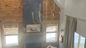 Smart TV, fireplace, books