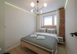 1 habitación, tabla de planchar con plancha, wifi y ropa de cama 