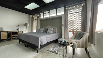 Deluxe Single Room, City View | In-room safe, desk, laptop workspace, blackout curtains