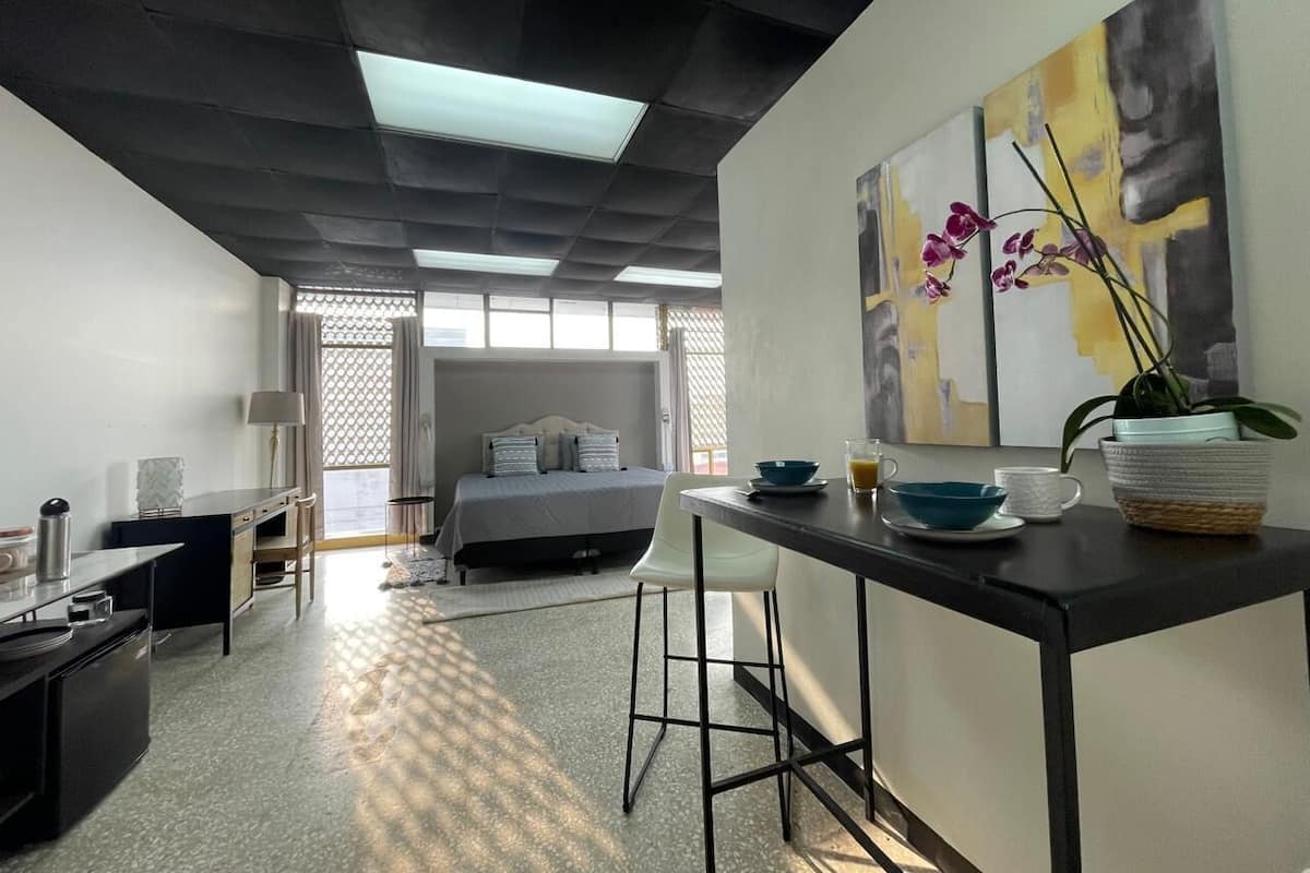 Deluxe Single Room, City View | In-room safe, desk, laptop workspace, blackout curtains