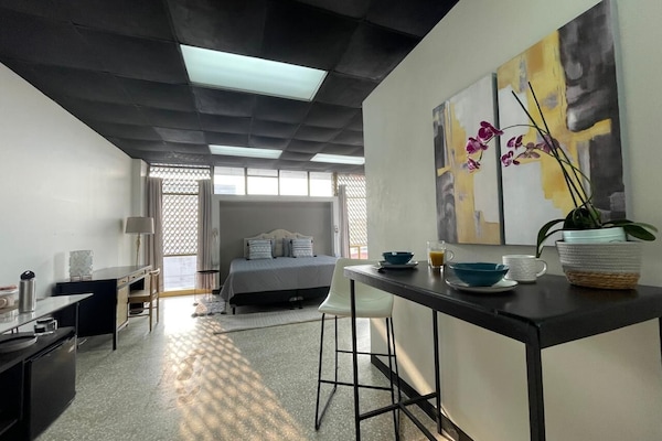 Deluxe Single Room, City View | In-room safe, desk, laptop workspace, blackout drapes