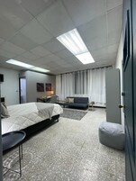 Standard Room, City View | In-room safe, desk, laptop workspace, blackout drapes