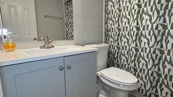 Hair dryer, towels, soap, shampoo