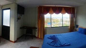 Luxury Room, Balcony, Park View | Desk, laptop workspace, blackout drapes, iron/ironing board