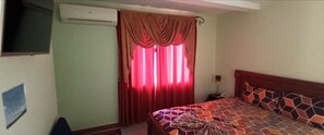 Economy Single Room, Microwave, Courtyard View | Desk, laptop workspace, blackout curtains, iron/ironing board - HOTEL SHEKINAH INTERNACIONAL (Esmeraldas)
