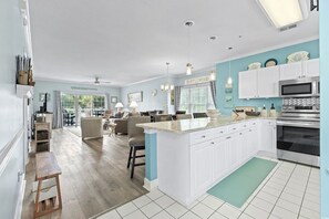 Fridge, microwave, oven, stovetop - Coastal Chic Myrtlewood Condo • Family Comfort & Golf Nearby (Myrtle Beach)