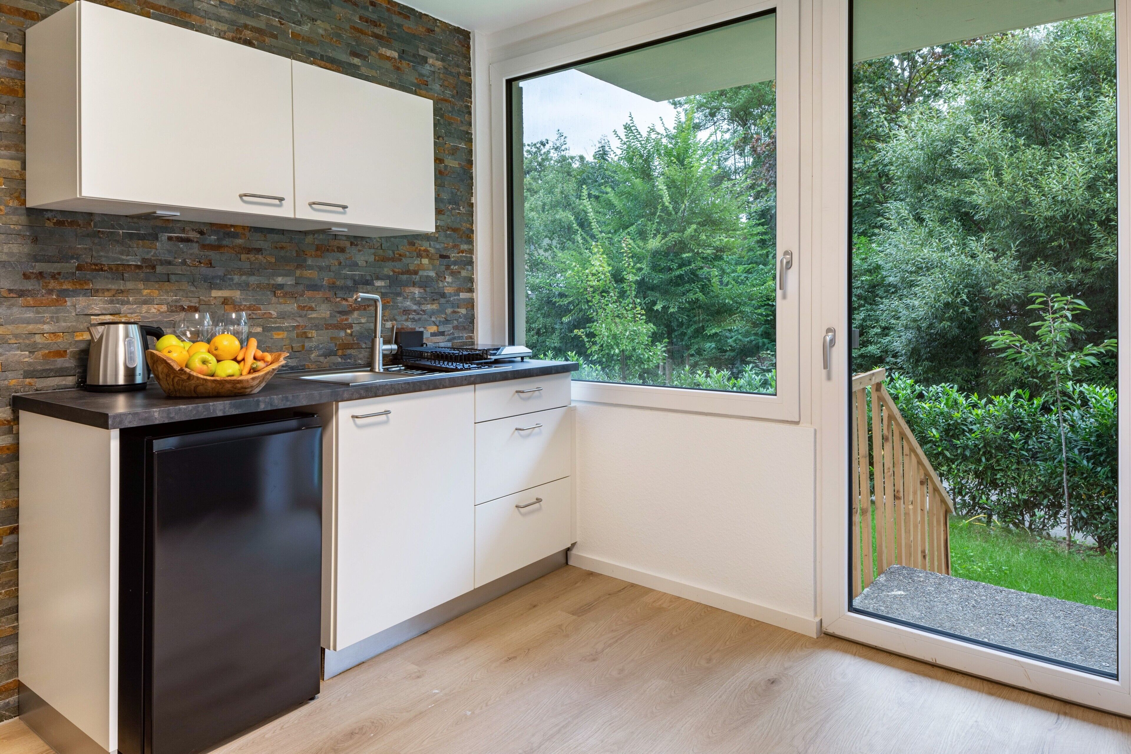 Fridge, stovetop, coffee/tea maker, electric kettle