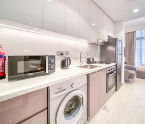 Fridge, microwave, coffee/tea maker, electric kettle