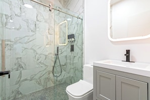 Hair dryer, towels, soap, toilet paper