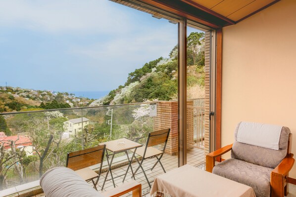 Comfort Room, Multiple Beds, Terrace, Mountain View | In-room safe, individually decorated, individually furnished