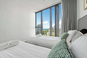 2 habitaciones, tabla de planchar con plancha, cuna de viaje y wifi 