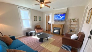 TV, fireplace - Cozy Renovated Bungalow — Walk Downtown! (White Sulphur Springs)