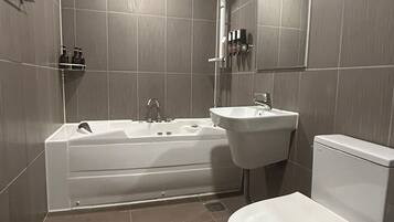 Deluxe Double Room, City View | Bathroom | Separate bathtub and shower, free toiletries, hair dryer, towels