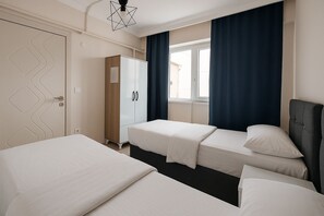 Appartamento familiare, balcone, vista città | 2 camere, una scrivania, ferro/asse da stiro, Wi-Fi gratuito