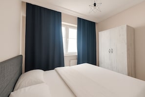 Family Apartment, Balcony, City View | Desk, iron/ironing board, free WiFi