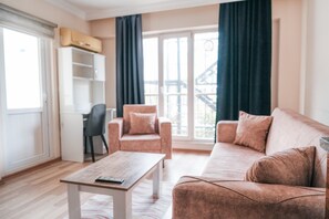 Comfort Condo | Living area | TV