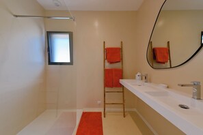 Shower, hair dryer, towels, soap
