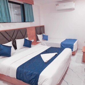 Family Suite, City View | Premium bedding, pillow-top beds, free WiFi, bed sheets - Hotel Era (Ahmedabad)