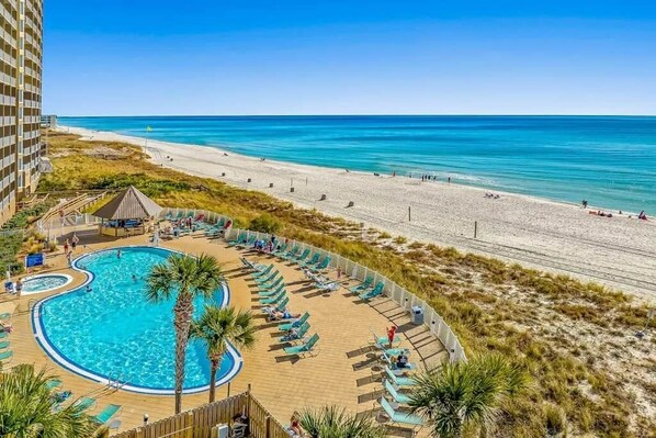 On the beach, sun-loungers, beach towels