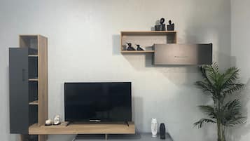 Luxury Apartment, City View | 1 bedroom, in-room safe, blackout curtains, iron/ironing board