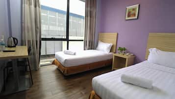 Habitación Deluxe con 2 camas individuales | 1 dormitorio, wifi gratis, ropa de cama
