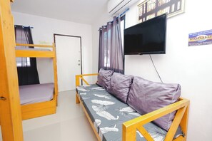 Family Room, Beach View | Desk, iron/ironing board, free WiFi, bed sheets - Monaliza Surf Resort (San Juan)