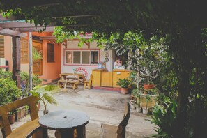 Family Room, Garden View | View from room - Monaliza Surf Resort (San Juan)