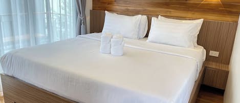 Superior Room, 1 King Bed, Balcony | Minibar, desk, free WiFi, bed sheets
