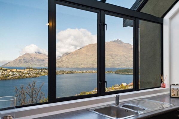 Interior - Mountain and lake views and wood burner inside. (Queenstown)