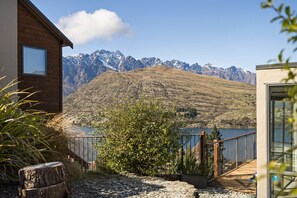 Property grounds - Mountain and lake views and wood burner inside. (Queenstown)