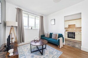 Departamento | Área de sala de estar | Televisión de 37 pulgadas con canales por cable y Netflix 