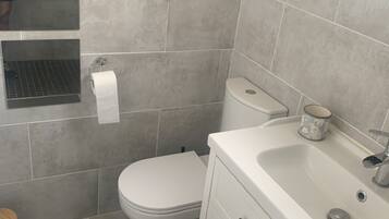 Hair dryer, towels, soap, shampoo