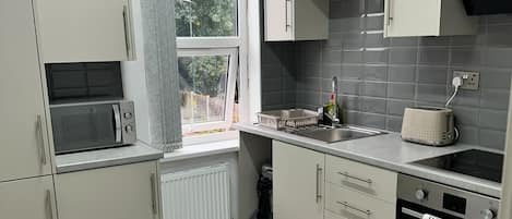 Apartment | Private kitchen | Fridge, microwave, oven, stovetop