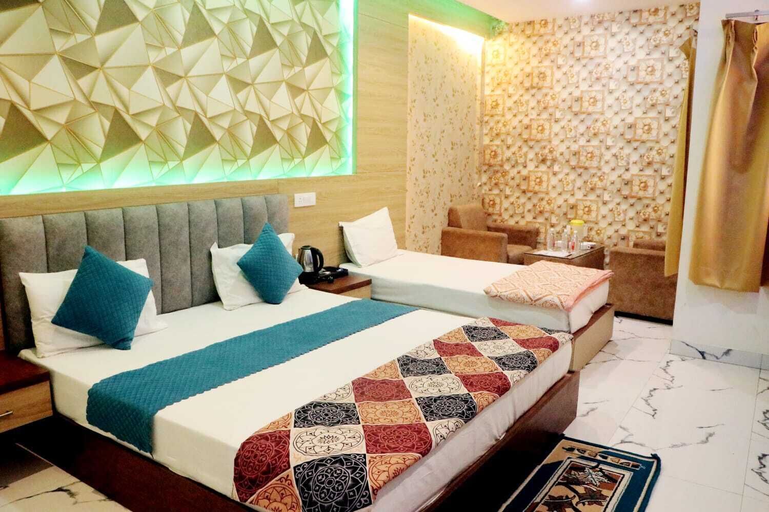 A hotel room with two beds, a modern geometric wall design, a patterned wallpaper, and a marble floor.