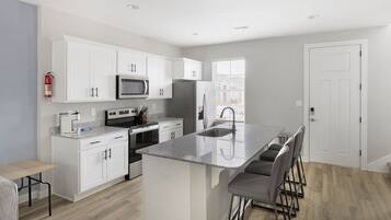 Apartment, 2 Bedrooms | Private kitchen | Full-size fridge, microwave, oven, stovetop