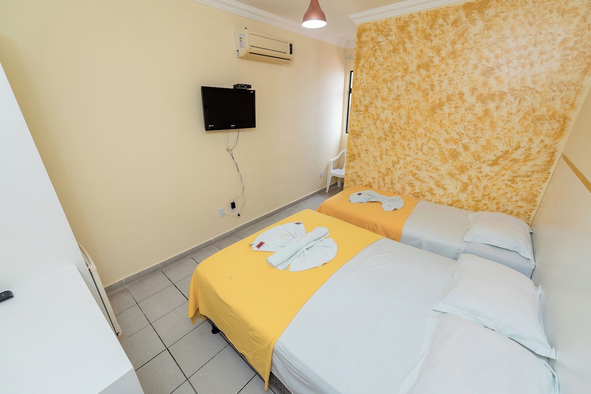 Triple Room, Non Smoking, Private Bathroom | Minibar, desk, laptop workspace, free WiFi