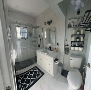 Hair dryer, towels, soap, toilet paper