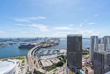 A Balcony with a direct view of the bay, the Kaseya Center and the Port Miami.