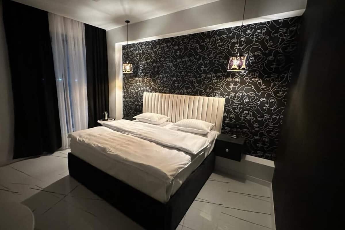 Minibar, ferro/asse da stiro, Wi-Fi gratuito, lenzuola