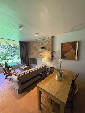 Premium Room | Living area | 50-inch Smart TV with cable channels, TV, pay movies